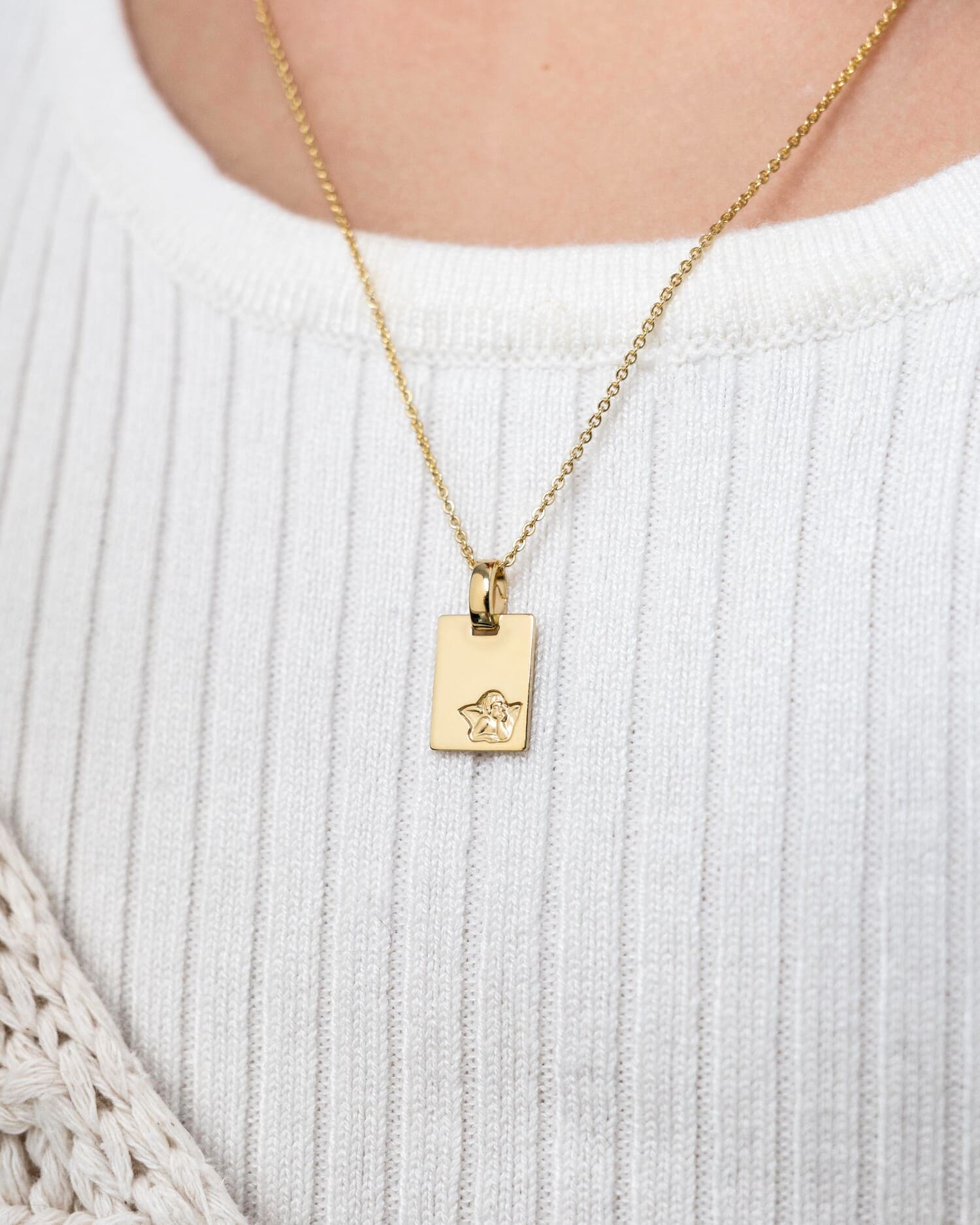 Engraved plates, pendants, necklaces, guardian angels