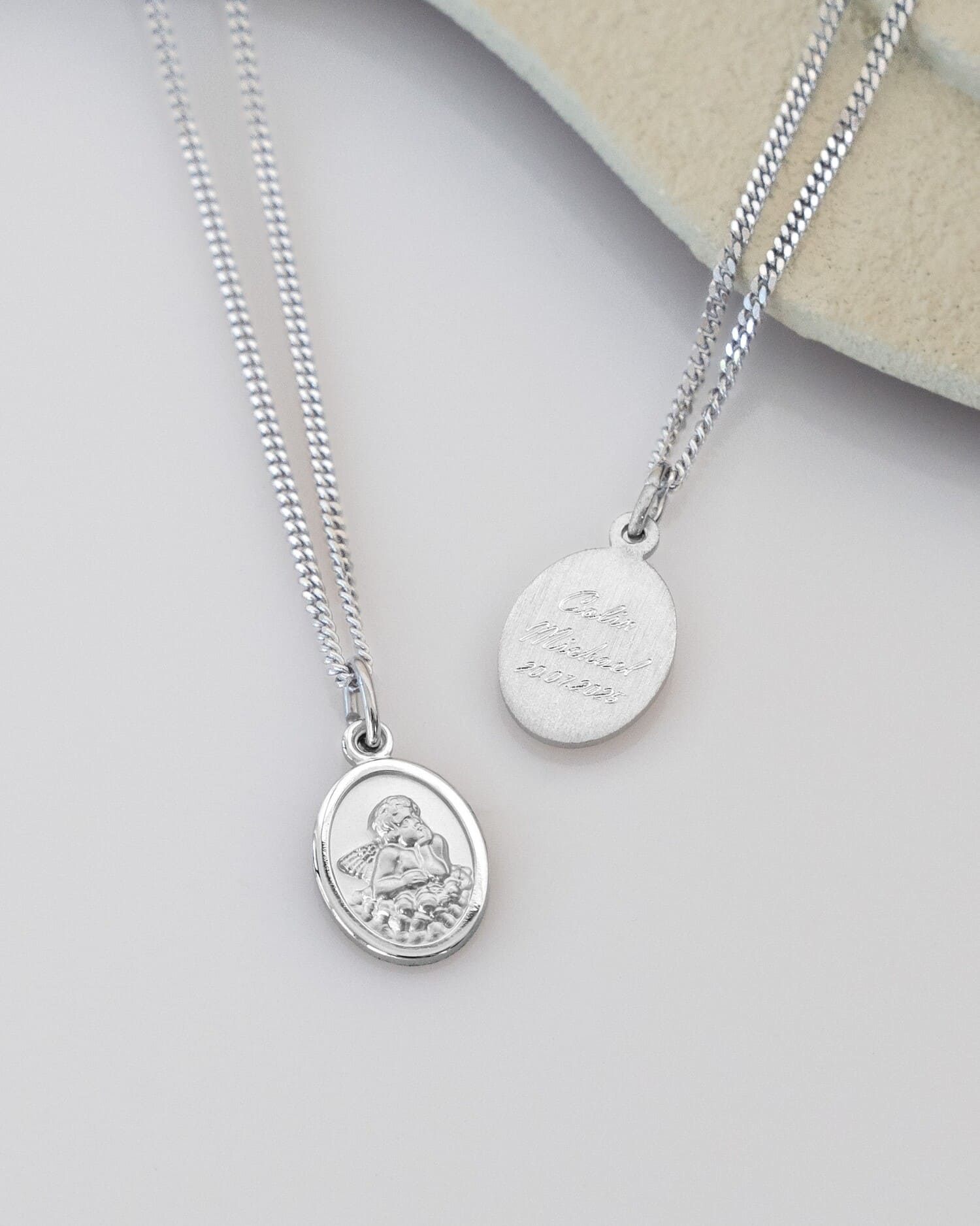 Engraved plates, pendants, necklaces, guardian angels