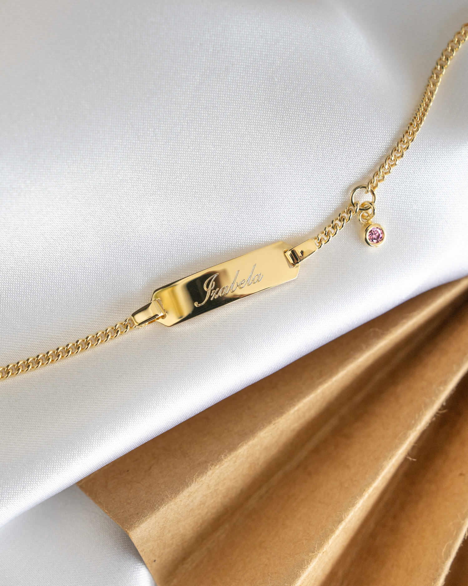 Graveerarmband graveerplaatje zirkonia roze