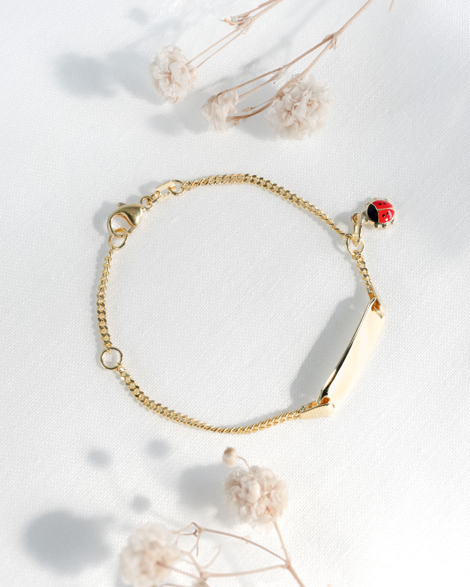Graveerarmband graveerplaat lieveheersbeestje